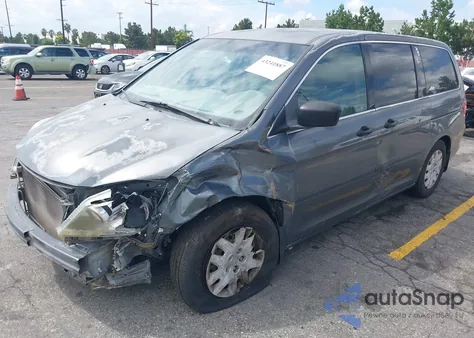 2010 Honda Odyssey Lx z USA, uszkodzony, nr VIN 5FNRL3H28AB099529